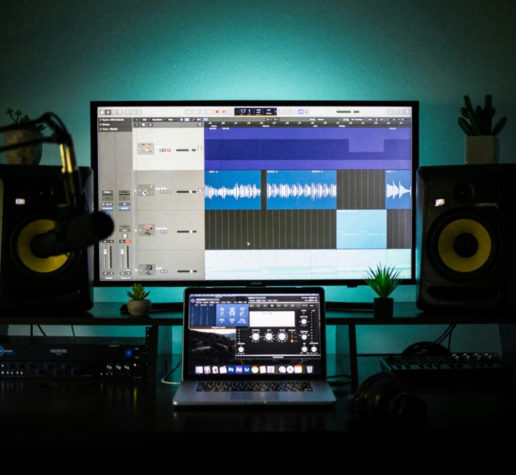 home studio set up showing computer with audio softaware open