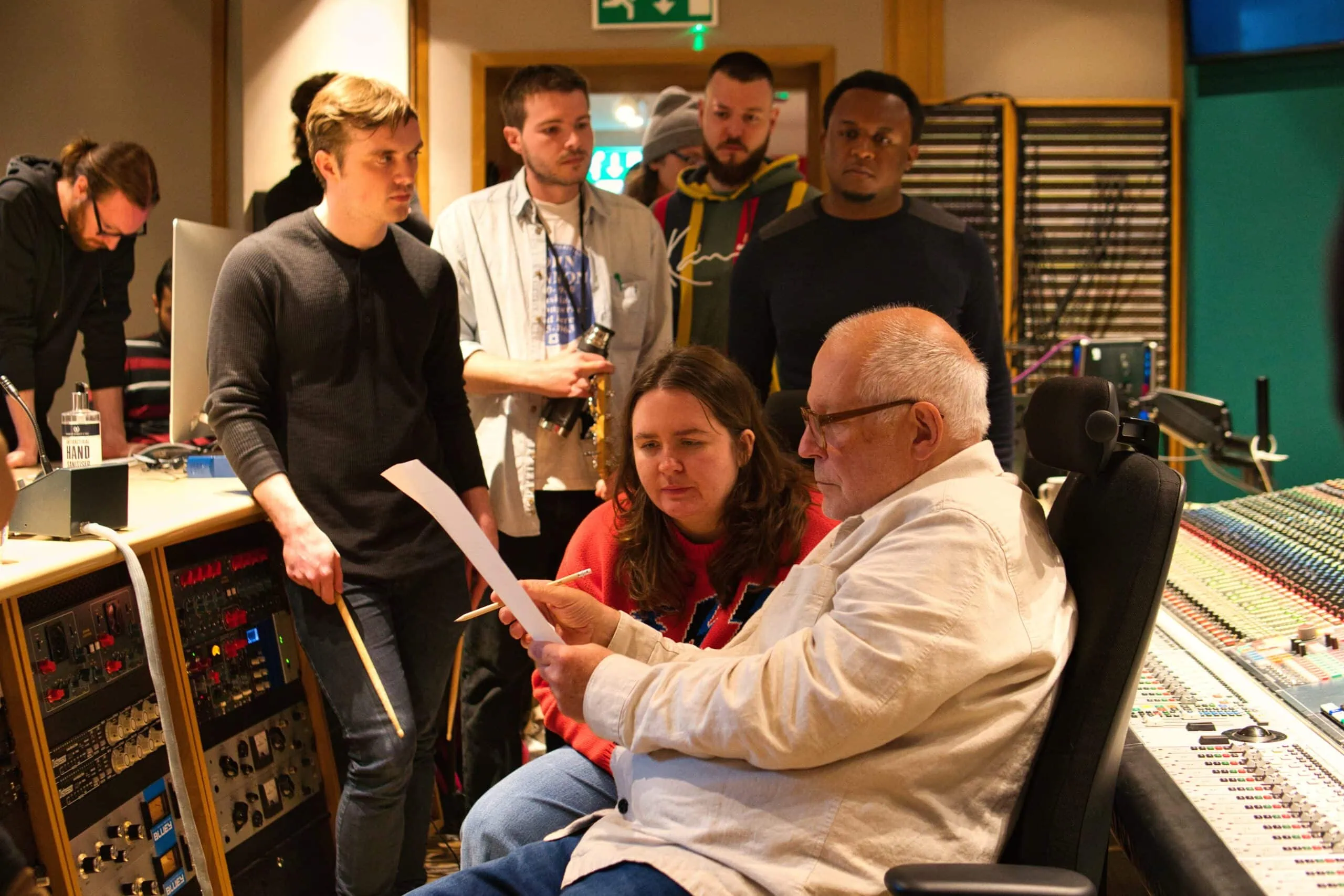 Haydn Bendall in the control room talking to the band