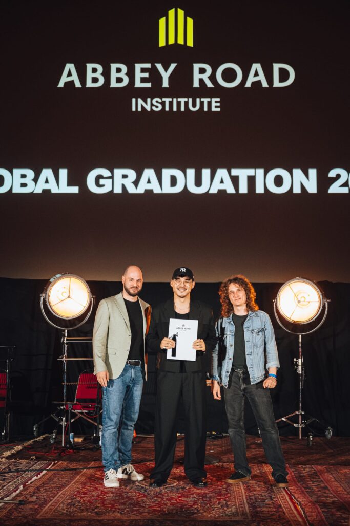 Graduate Martin Sham receiving his diploma