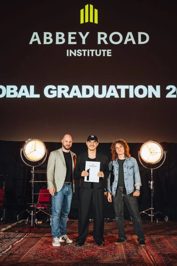 Graduate Martin Sham receiving his diploma