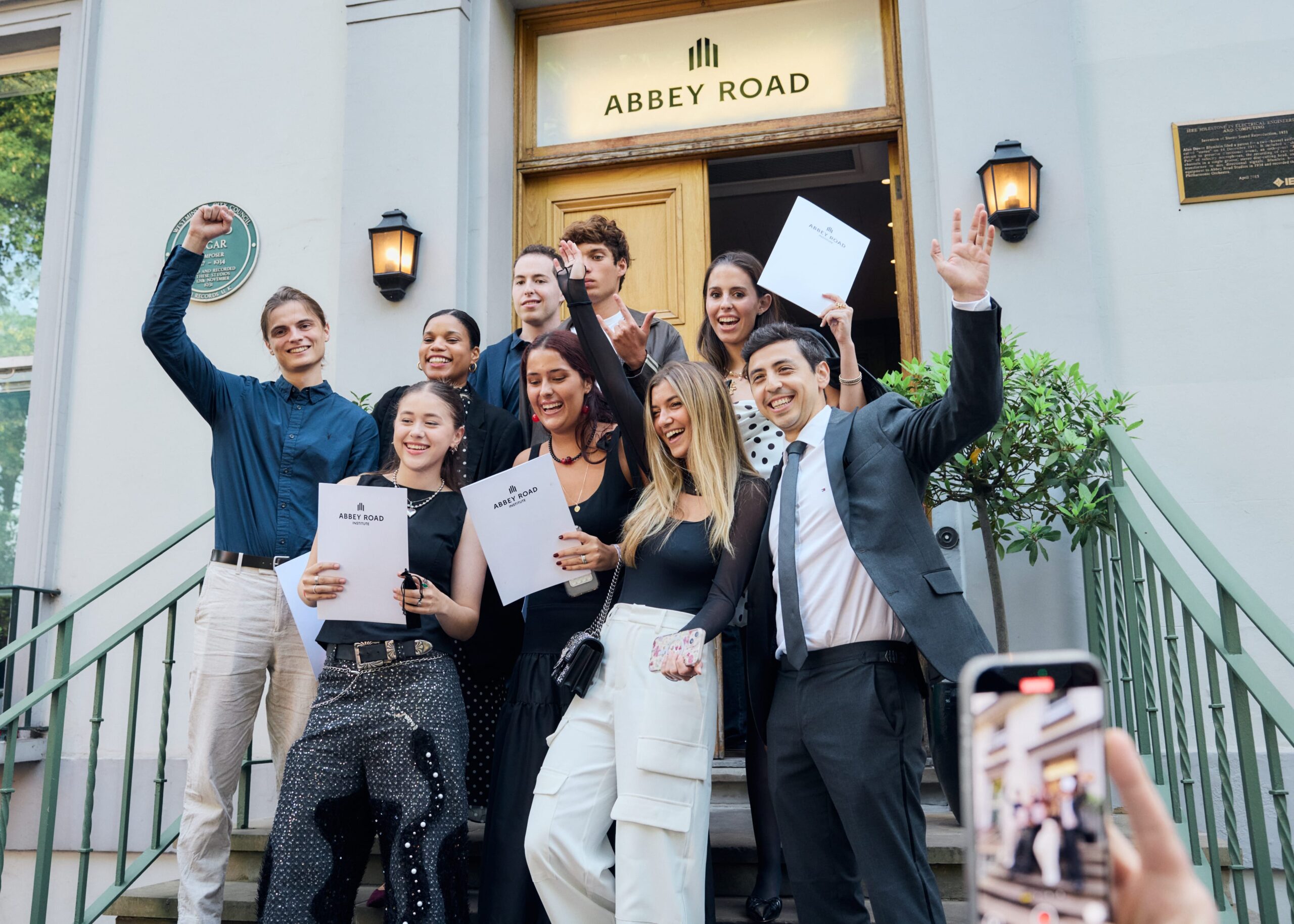 Group picture on the famous doorsteps of Abbey Road Studios London