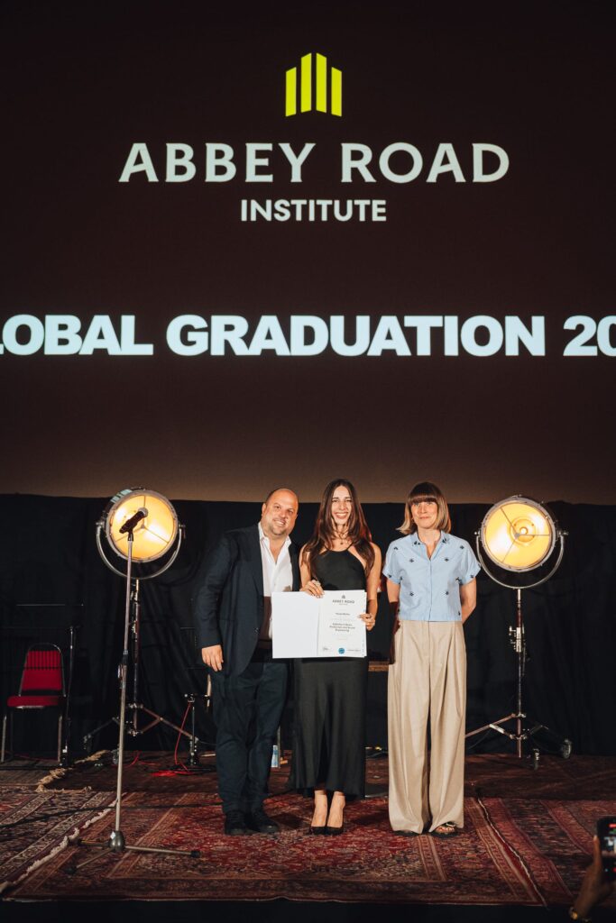 abbey road institute miami graduate receiving diploma