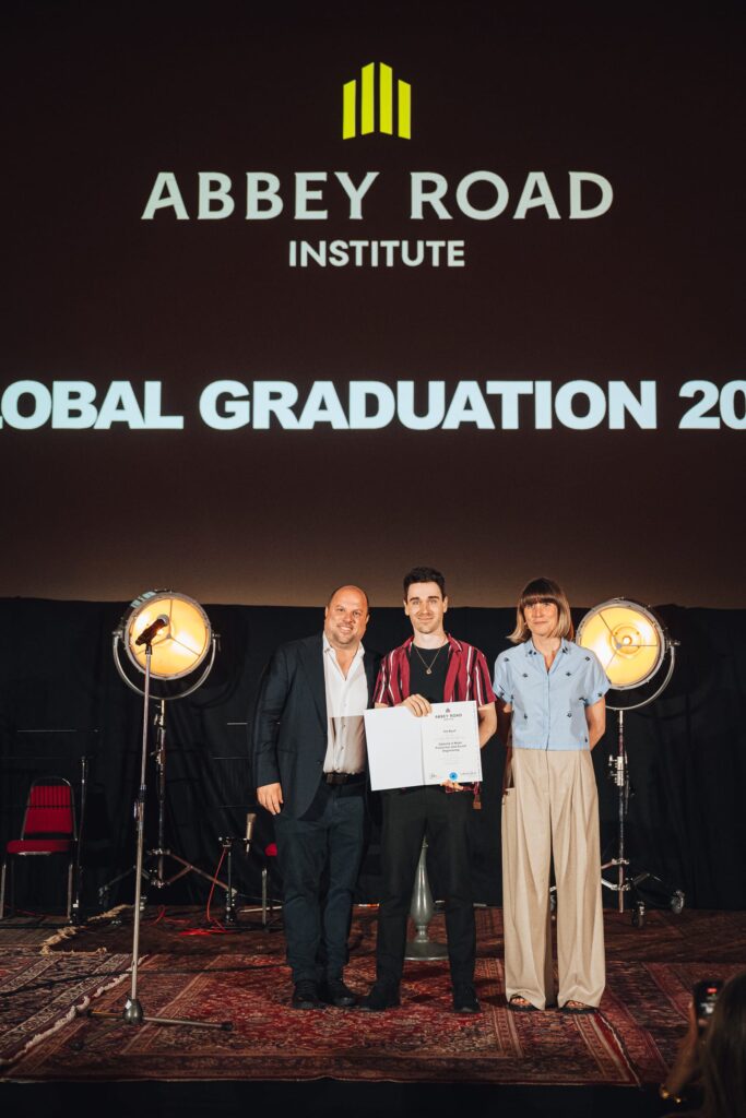 abbey road institute miami graduate receiving diploma